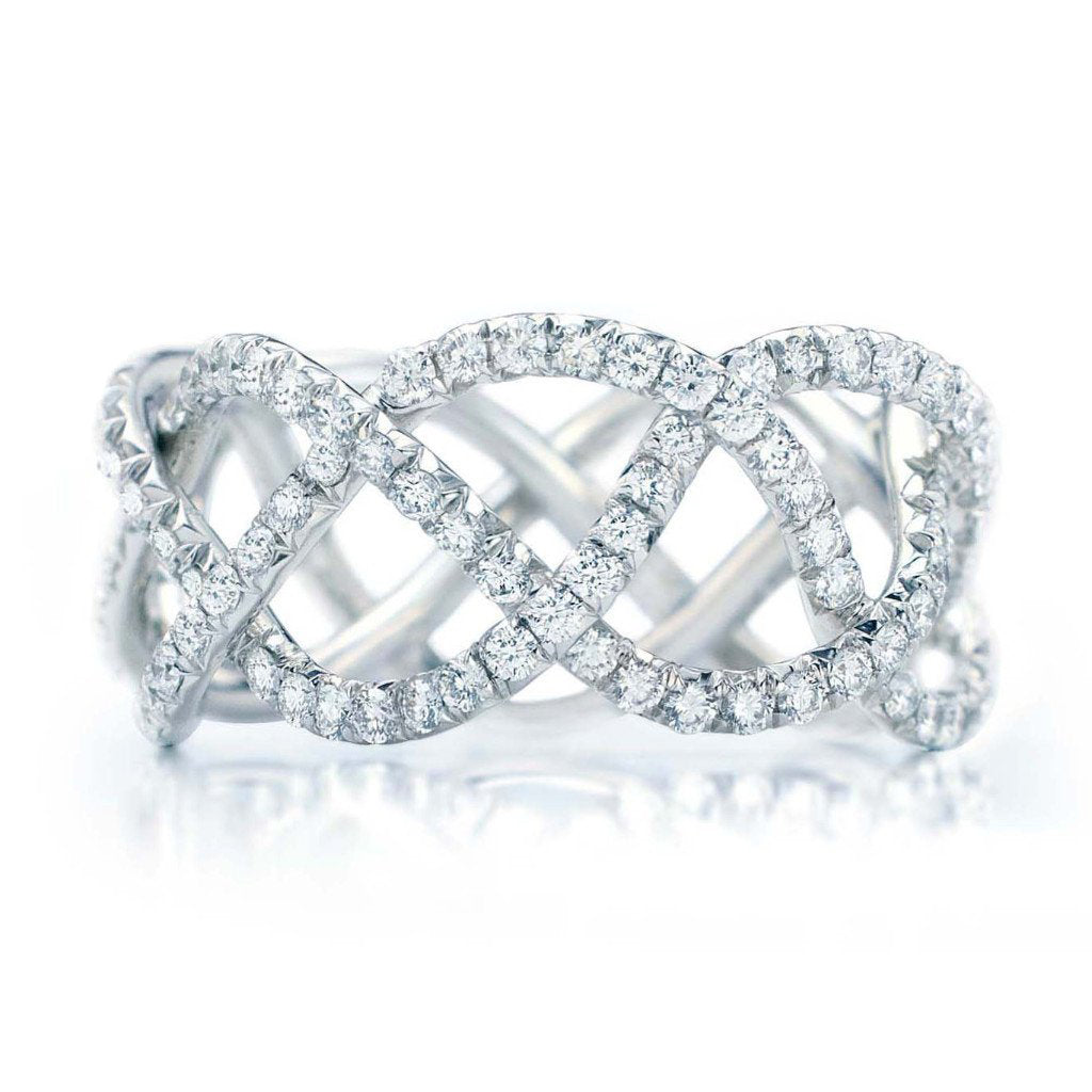 Elegant platinum ring featuring a three-row pave design with intricately woven diamond bands, creating a dazzling and sophisticated look ideal for luxurious occasions.