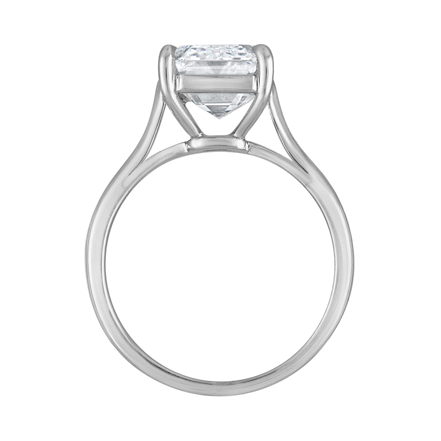 Side view of the Five Carat Emerald Cut Solitaire Diamond Ring featuring a 5.01 carat K color SI1 clarity diamond, elegantly set in platinum. Made in New York, designed by Susan Kottemann.