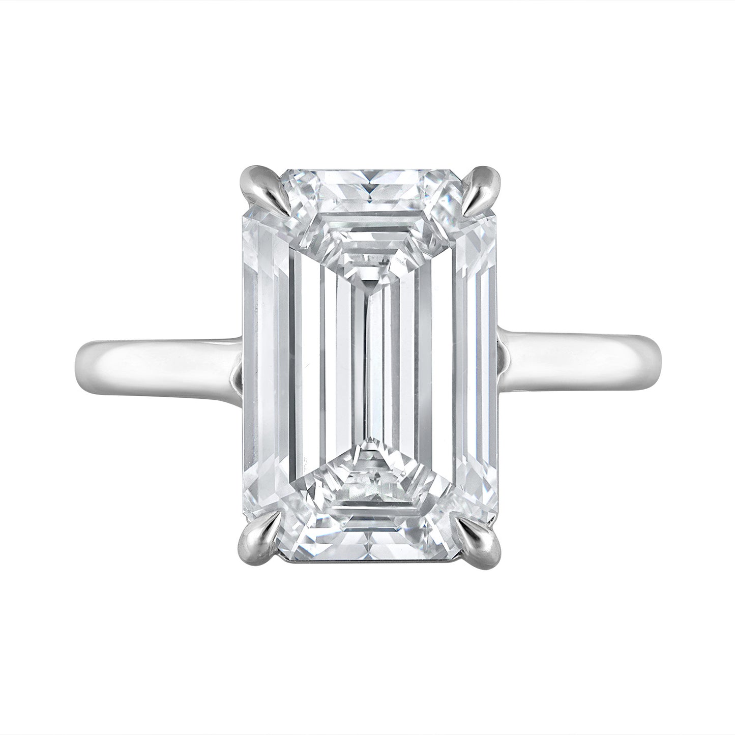 Front view of the Five Carat Emerald Cut Solitaire Diamond Ring featuring a 5.01 carat K color SI1 clarity diamond, set in a handmade platinum setting. Designed by Susan Kottemann.