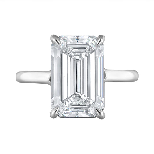 Front view of the Five Carat Emerald Cut Solitaire Diamond Ring featuring a 5.01 carat K color SI1 clarity diamond, set in a handmade platinum setting. Designed by Susan Kottemann.