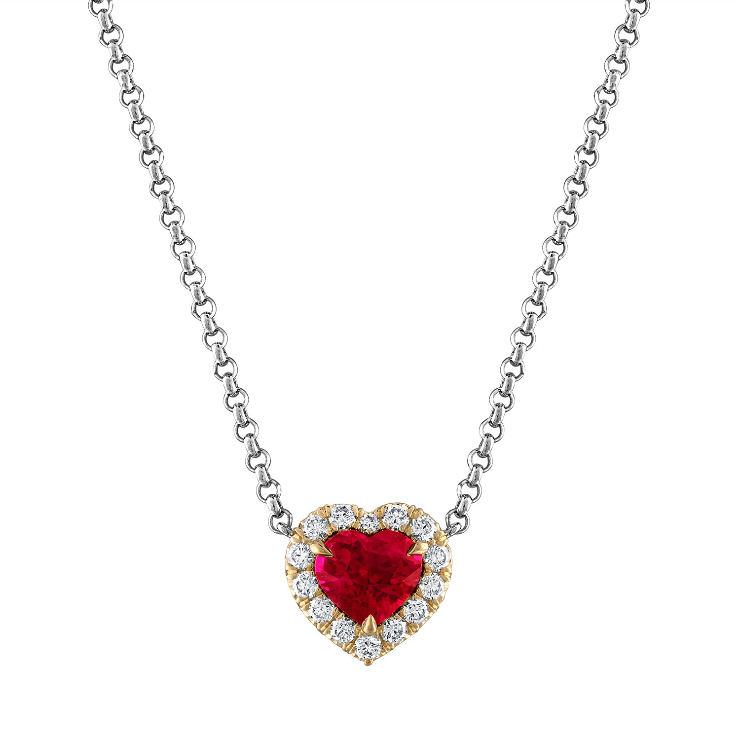 Stunning necklace with a two-carat heart-shaped Burmese ruby set in yellow gold, encircled by a halo of top-quality colorless diamonds. The pendant hangs from a platinum 'rolo' chain, offering a striking contrast and a versatile, stackable look.